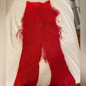 Red beautiful pants from Meshki and it looks gorgeous with black tops